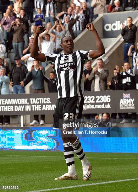 Shola Ameobi of Newcastle United celebrates after scoring the 2:0 goal during the Coca-Cola Championship match between Newcastle United and Reading...