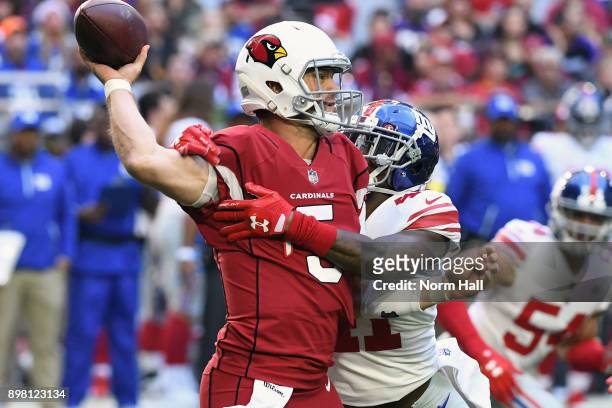 Quarterback Drew Stanton of the Arizona Cardinals makes a pass against cornerback Dominique Rodgers-Cromartie of the New York Giants in the first...