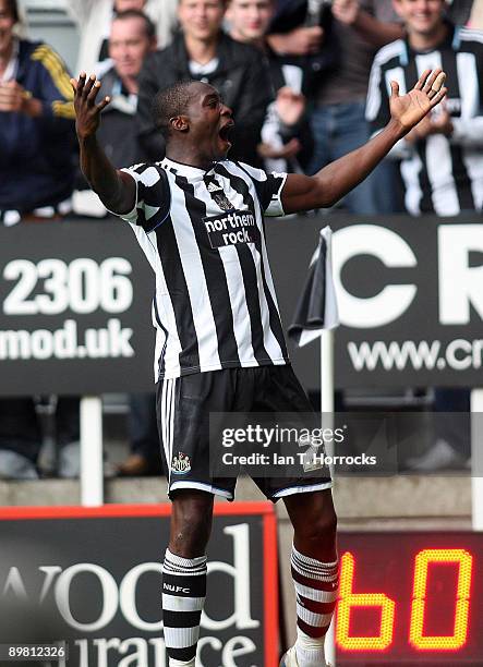 Shola Ameobi of Newcastle United celebrates after scoring the 2:0 goal during the Coca-Cola Championship match between Newcastle United and Reading...