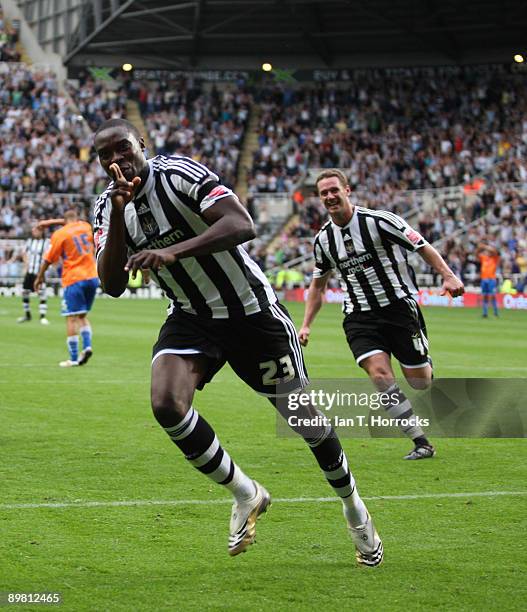 Shola Ameobi of Newcastle United celebrates after scoring the 3:0 goal from a penalty during the Coca-Cola Championship match between Newcastle...