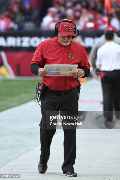 Head coach Bruce Arians of the Arizona Cardinals walks the sidelines in the first half of the NFL game against the New York Giants at University of...