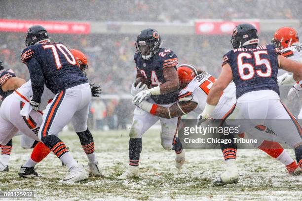 Chicago Bears running back Jordan Howard runs in a touchdown during the first half against the Cleveland Browns at Soldier Field Sunday Dec. 24 in...