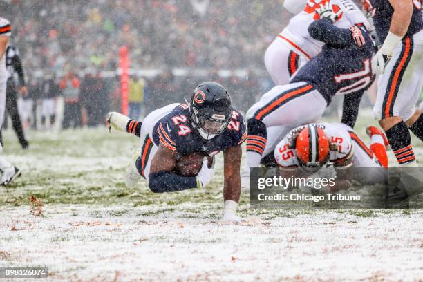 Chicago Bears running back Jordan Howard scores a touchdown during the first half against the Cleveland Browns at Soldier Field Sunday Dec. 24 in...