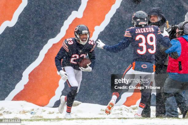 Chicago Bears cornerback Kyle Fuller celebrates with Chicago Bears free safety Eddie Jackson after making an interception during the first half...