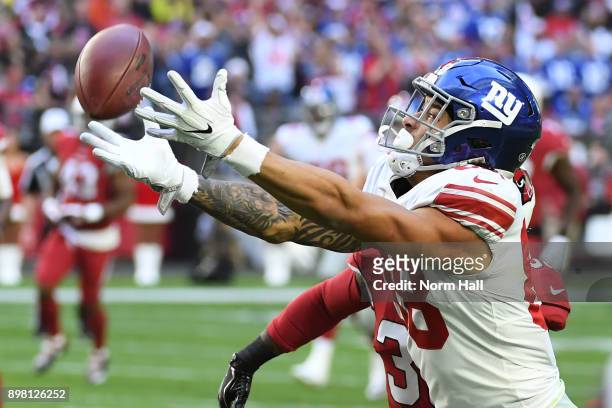 Tight end Evan Engram of the New York Giants is unable to catch the pass against the Arizona Cardinals in the first half at University of Phoenix...
