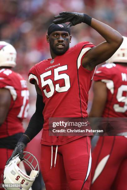 Outside linebacker Chandler Jones of the Arizona Cardinals looks on in the first half of the NFL game against the New York Giants at University of...