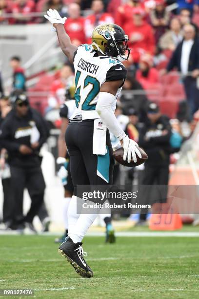 Barry Church of the Jacksonville Jaguars celebrates after an interception of Jimmy Garoppolo of the San Francisco 49ers in the end zone during their...