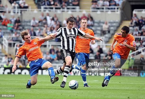 Joey Barton of Newcastle United battles for the ball during the Coca-Cola Championship match between Newcastle United and Reading at St James' Park...