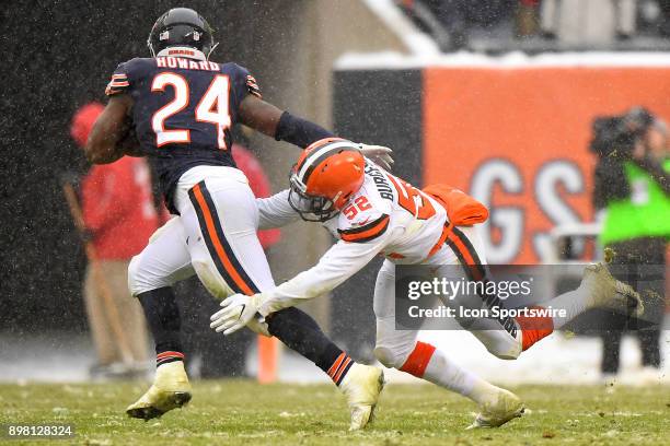 Cleveland Browns outside linebacker James Burgess tackles Chicago Bears running back Jordan Howard during the game between the Chicago Bears and the...