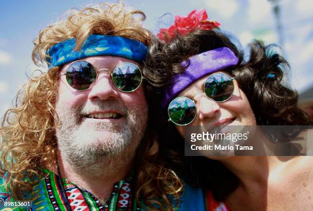 Judy Remo and John Micik wait to attend the concert marking the 40th anniversary of the Woodstock music festival August 15, 2009 in Bethel, New York....