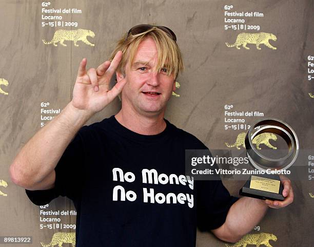 Director Detlev Buck poses with the Variety Piazza Grande award for the movie 'Same Same But Different' during the 62nd Locarno International Film...