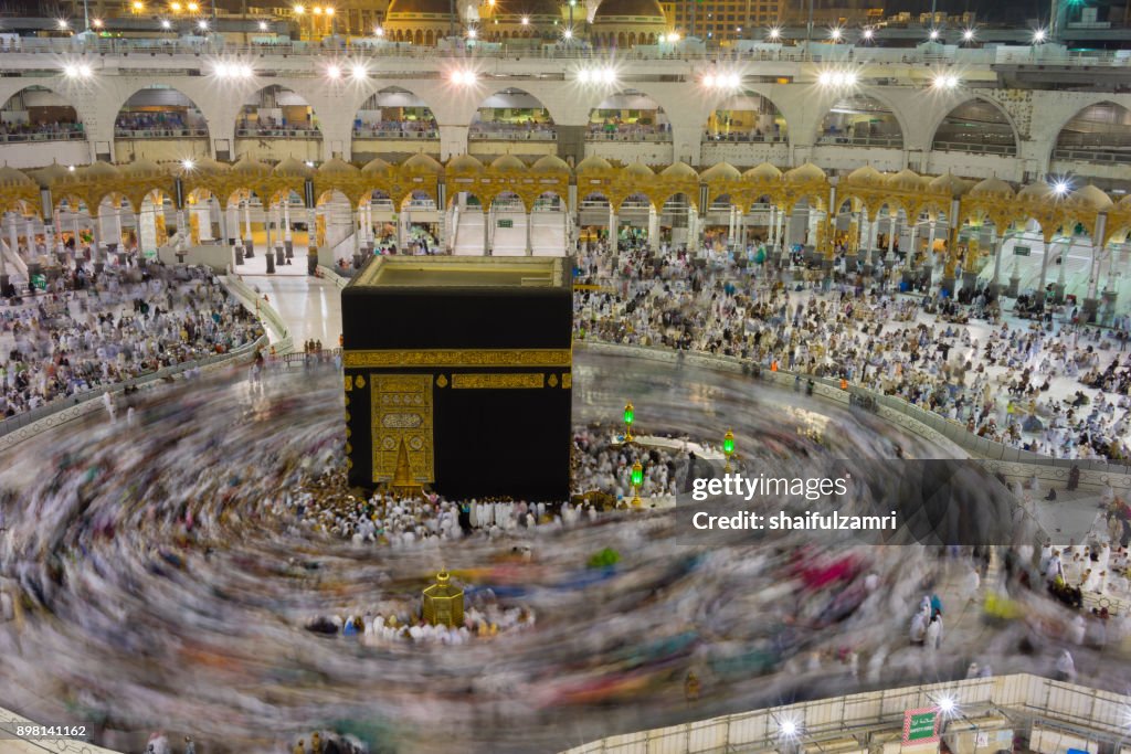 Muslim pilgrims circumambulate or "tawaf" the Kaabah after Subuh prayer at Masjidil Haram