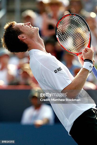 Andy Murray of Great Britain celebrates match point against Jo-Wilrried Tsonga of France during the semifinals of the Rogers Cup at Uniprix Stadium...
