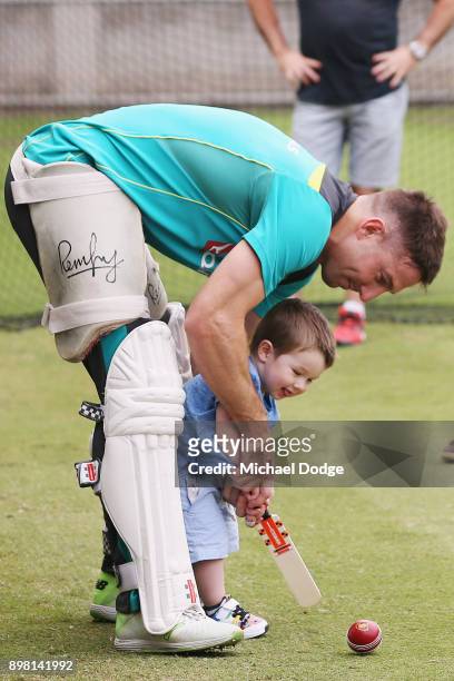 Shaun Marsh hits the ball with son Austin during the Australian nets session at the on December 25, 2017 in Melbourne, Australia.