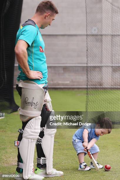 Shaun Marsh watches son Austin hit the ball during the Australian nets session at the Melbourne Cricket Ground on December 25, 2017 in Melbourne,...