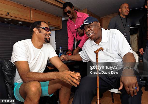 Legends Walt "Clyde" Frazier and Cal Ramsey share a moment at the Joe Joseph Abboud & NBA Block Party on August 15, 2009 in New York City. NOTE TO...