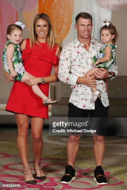 Candice Warner and David Warner pose with their daughters Ivy and Indi during the Australian nets session at the on December 25, 2017 in Melbourne,...