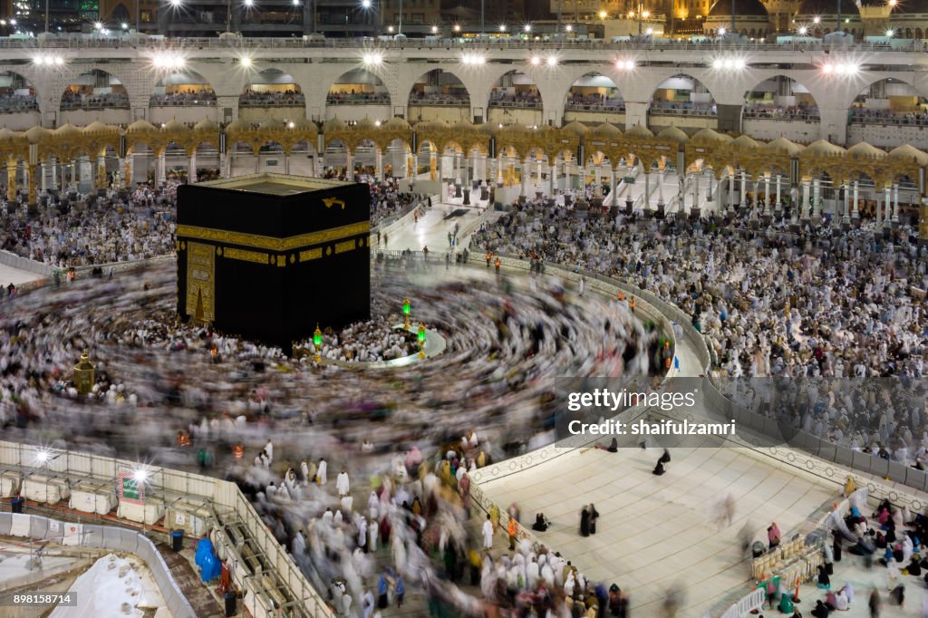 Muslim pilgrims circumambulate or "tawaf" the Kaabah after Subuh prayer at Masjidil Haram