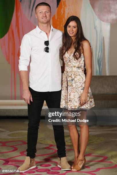 Jackson Bird poses with Scarlett Lennard at Crown Metropol after the Australian nets session on December 25, 2017 in Melbourne, Australia.