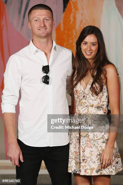 Jackson Bird poses with Scarlett Lennard at Crown Metropol after the Australian nets session on December 25, 2017 in Melbourne, Australia.