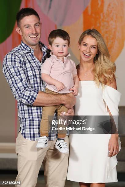 Shaun Marsh and Bec Marsh pose with son Austin at Crown Metropol after the Australian nets session on December 25, 2017 in Melbourne, Australia.