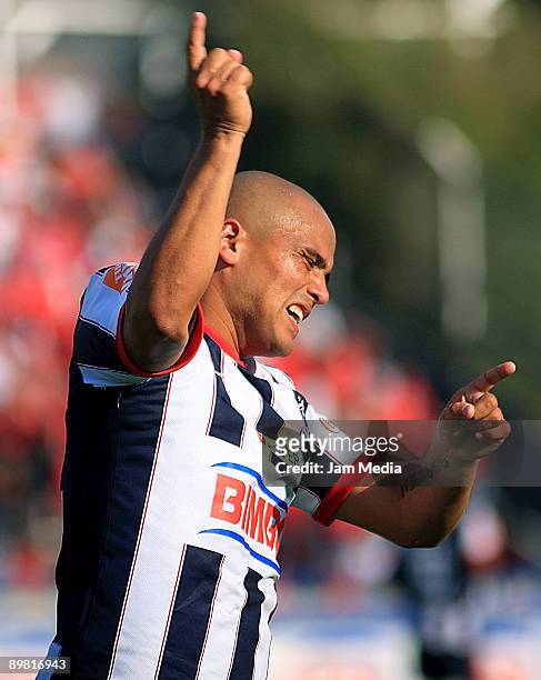 Humberto Suazo of Rayados de Monterrey celebrates after scoring against Toluca in a Mexican League Apertura 2009 soccer match at the Tecnologico...