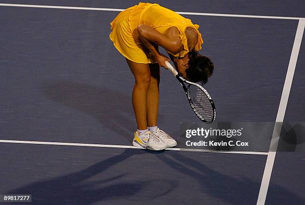 Jelena Jankovic of Serbia reacts after losing a point to Elena Dementieva of Russia during the semifinals of the Western & Southern Financial Group...