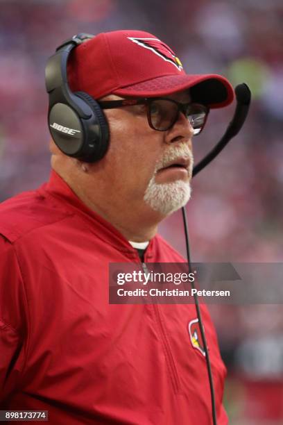 Head coach Bruce Arians of the Arizona Cardinals watches from the sidelines during the first half of the NFL game against the New York Giants at the...