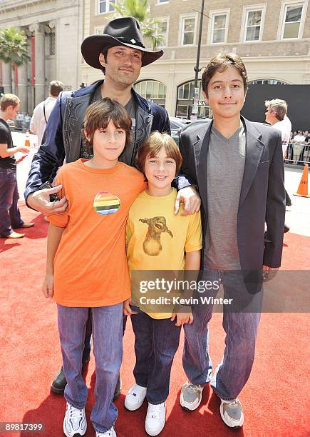 Director Robert Rodriguez and his sons Racer , Rebel and Rocket arrive at the premiere of Warner Bros.' "Shorts" at the Chinese Theater on August 15,...