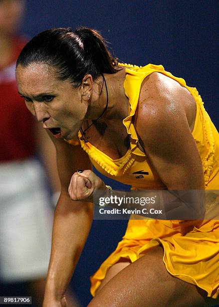 Jelena Jankovic of Serbia reacts after winning a point against Elena Dementieva of Russia during the semifinals of the Western & Southern Financial...