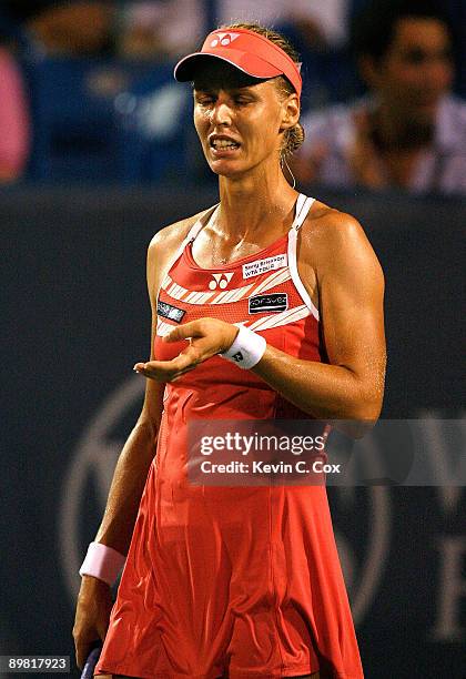 Elena Dementieva of Russia reacts after losing a point to Jelena Jankovic of Serbia during the semifinals of the Western & Southern Financial Group...