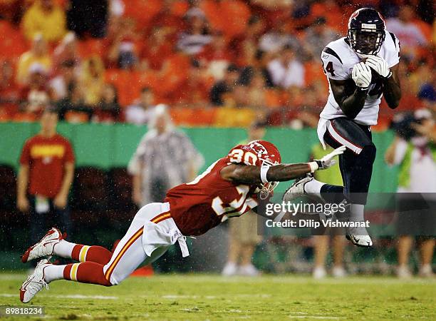 Wide receiver Darnell Jenkins of the Houston Texans makes a catch as cornerback Ricardo Colclough of the Kansas City Chiefs covers during the...