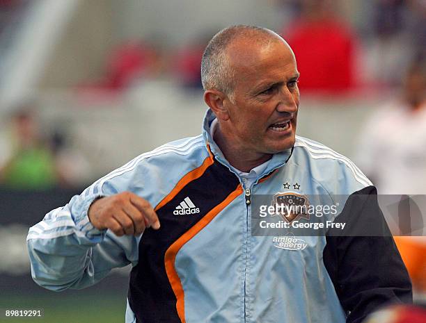 Head coach Dominic Kinnear of Houston Dynamo coaches his team against Real Salt Lake during the MLS game at Rio Tinto Stadium August 15, 2009 in...
