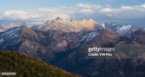 Looking south from this vantage point above Germainia Creek Valley, the entire Boulder Mountains stretch out as far as the eye can see. These are...