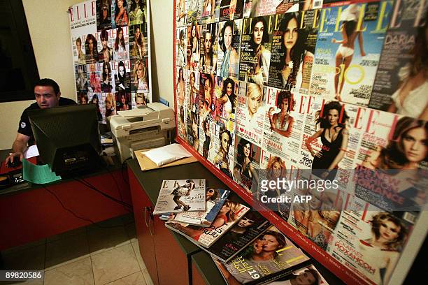 Lebanese journalist works at the publication's office in Awkar, north of Beirut, on August 13, 2009. France-based women's mags Elle and Marie-Claire,...