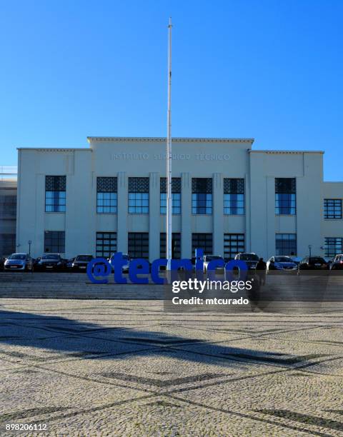 instituto superior técnico (ist), locally know simply as 'técnico' is portugal's most prestigious engineering school - main building and twitter handle - lisbon - técnico stock pictures, royalty-free photos & images