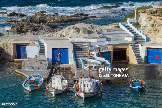 mandrakia seaside settlement, milos island, greece - red de arrastre fotografías e imágenes de stock