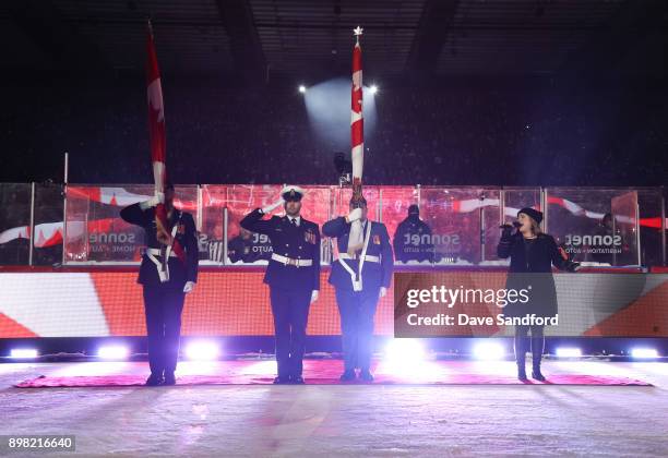 Serena Ryder sings the Canadian national anthem during the 2017 Scotiabank NHL100 Classic at Lansdowne Park on December 16, 2017 in Ottawa, Canada.