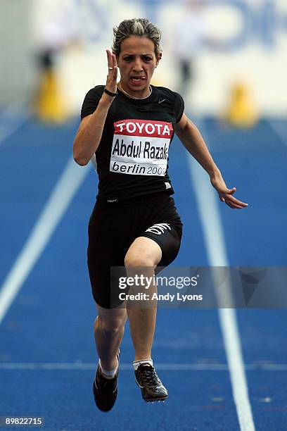 Dana Abdul Razak of Iraq competes in the women's 100 Metres Heats during day two of the 12th IAAF World Athletics Championships at the Olympic...