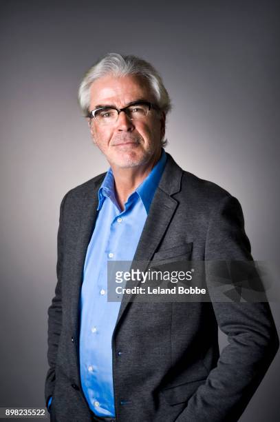 portrait of middle aged man with gray hair wearing glasses - blue blazer stock pictures, royalty-free photos & images