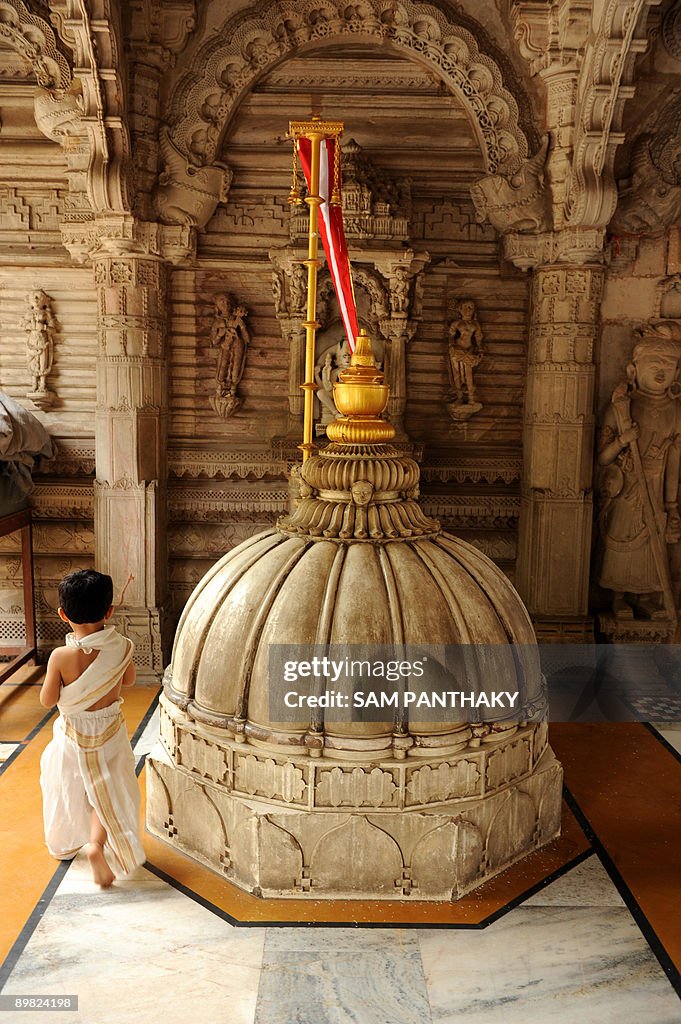 A young Indian Jain devotees wearing tra