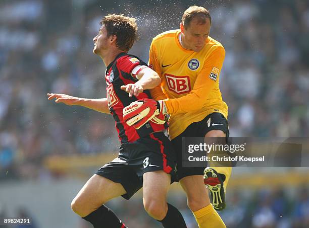 Jaroslav Drobny of Berlin clashes with Arne Friedrich of Berlin during the Bundesliga match between Borussia Moenchengladbach and Hertha BSC Berlin...