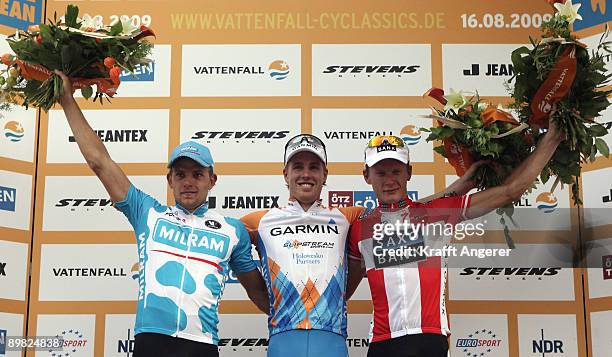 Gerald Ciolek of Germany and Milram Team , Tyler Farrar of USA and Garmin-Slipstream team and Matti Breschel of Denmark and Saxo Bank team pose after...