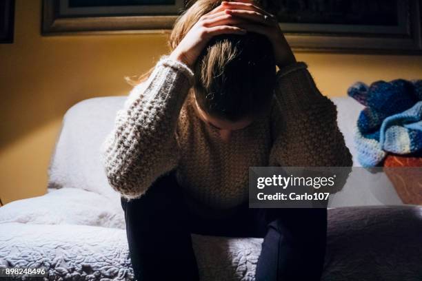 woman suffering from depression - mental health depression stock pictures, royalty-free photos & images