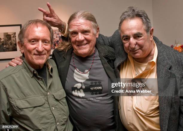 Photographers Baron Wolman, Henry Diltz, and Jim Marshall attend the Woodstock: The 40th Anniversary in Pictures' Opening Reception for Artists at...