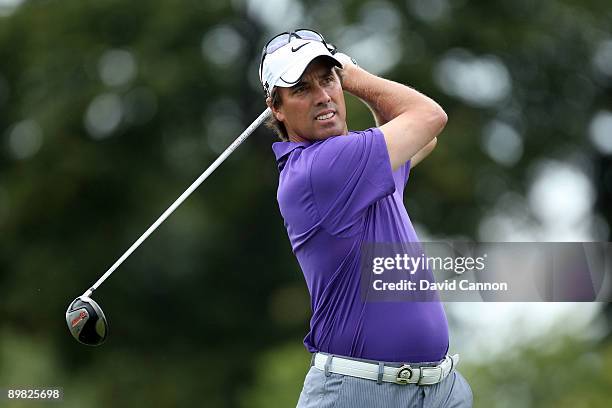 Stephen Ames of Canada hits his tee shot on the first hole during the final round of the 91st PGA Championship at Hazeltine National Golf Club on...