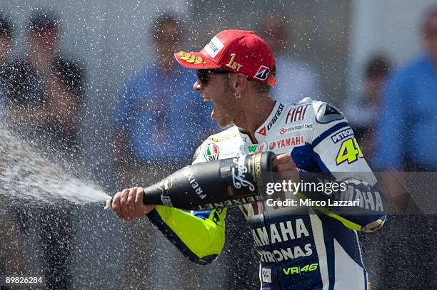 Valentino Rossi of Italy and Fiat Yamaha Team sprays champagne on the podium after the MotoGP race of MotoGP World Championship Grand Prix of Czech...