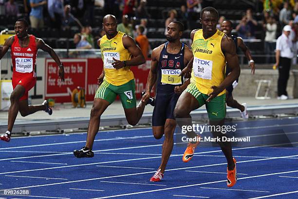 Asafa Powell of Jamaica, Tyson Gay of United States and Usain Bolt of Jamaica compete in the men's 100 Metres Final during day two of the 12th IAAF...