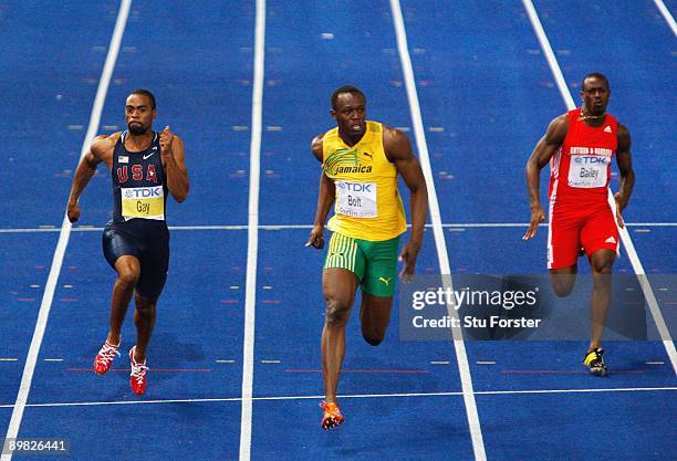 Tyson Gay of United States, Usain Bolt of Jamaica and Daniel Bailey of Antigua and Barbuda compete in the men's 100 Metres Final during day two of...