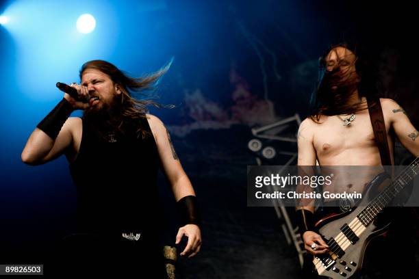 Johan Hegg and Ted Lundstrom of Amon Amarth perform on stage on the last day of Bloodstock Open Air festival at Catton Hall on August 16, 2009 in...